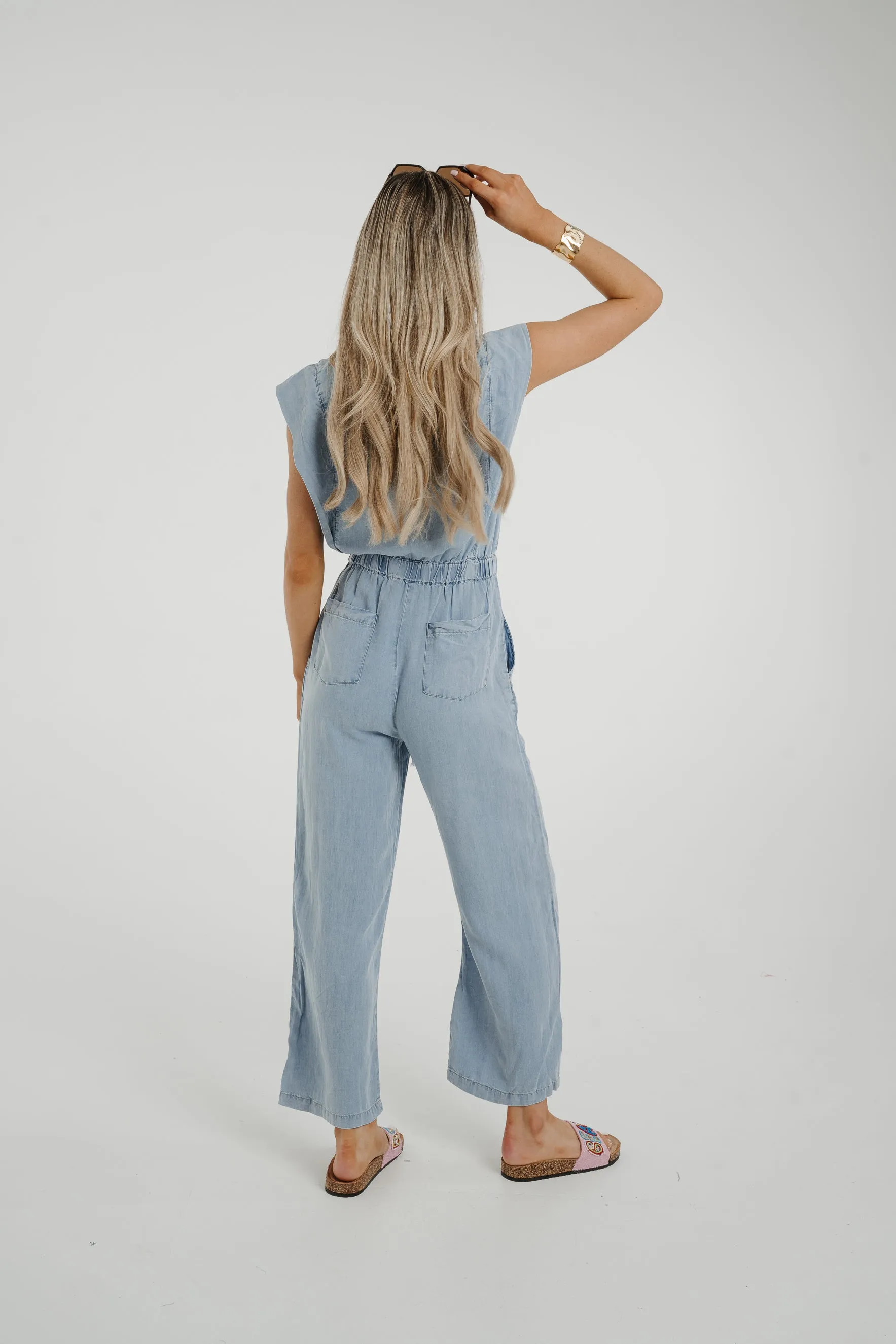 Cora Frill Shoulder Jumpsuit In Light Wash