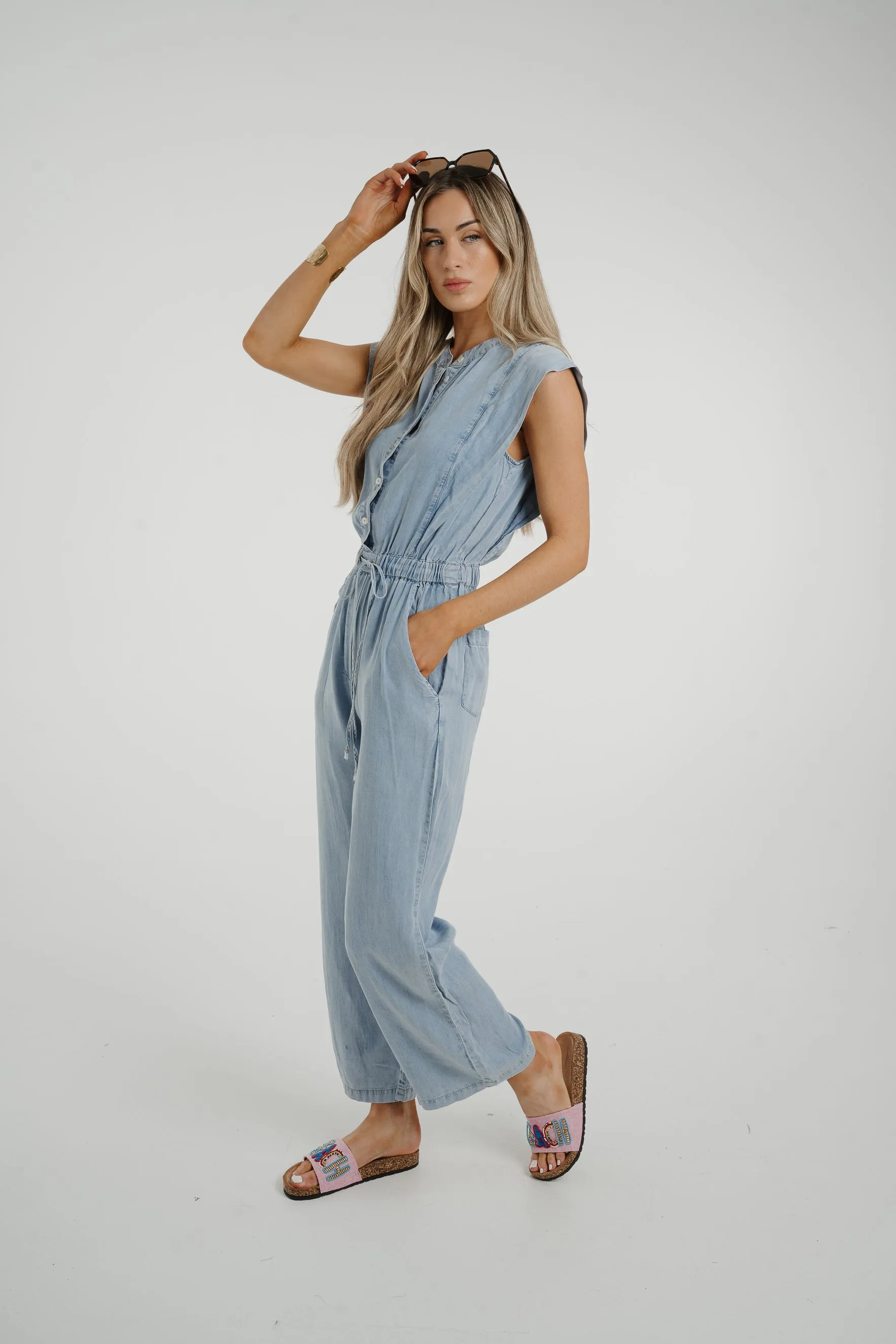 Cora Frill Shoulder Jumpsuit In Light Wash