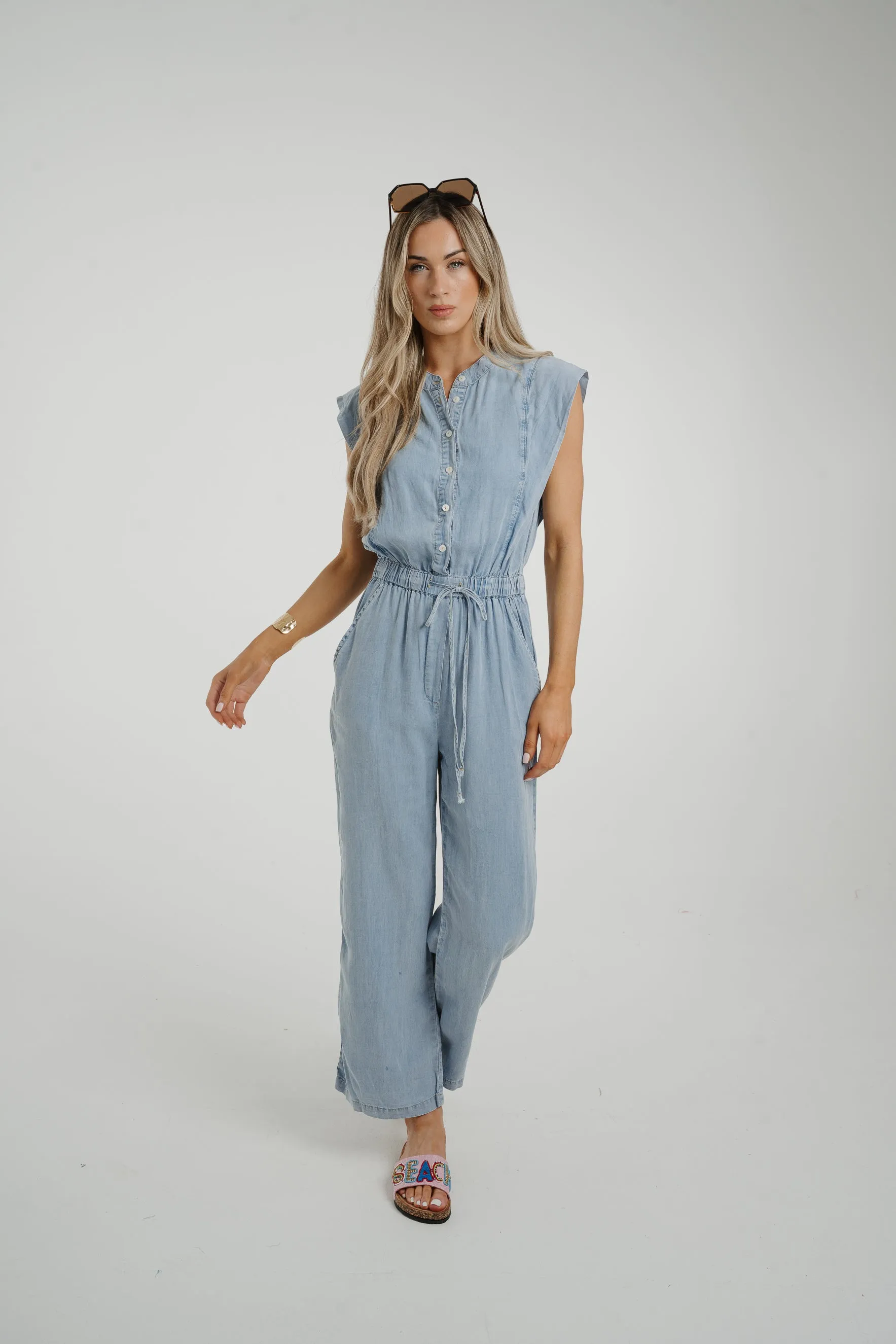 Cora Frill Shoulder Jumpsuit In Light Wash