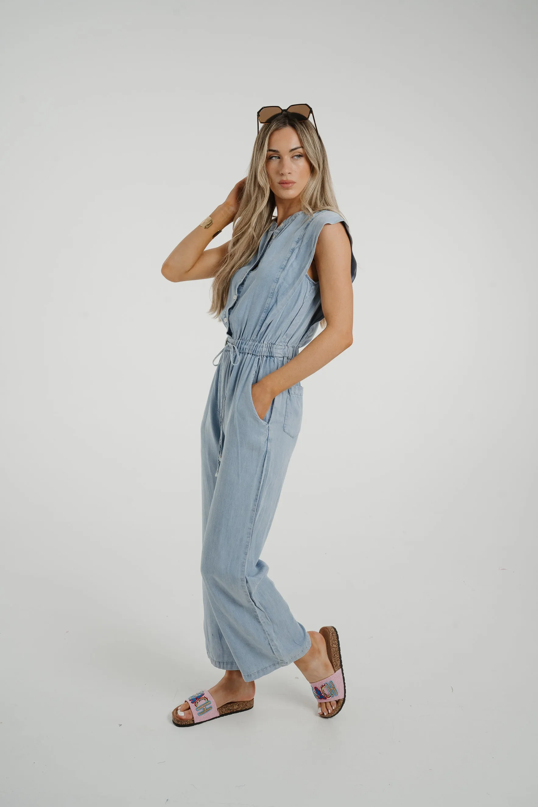 Cora Frill Shoulder Jumpsuit In Light Wash